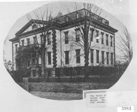 Undated photograph of the Southeast corner of the Old Naval Hospital with Tunnicliff's Tavern  visible at the far left