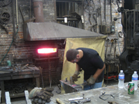 Fence - at G. Krug and Sons - forging fillets (scrolls) by hand - September 28, 2010