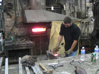 Fence - at G. Krug and Sons - forging fillets (scrolls) by hand.