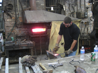 Fence - at G. Krug and Sons - forging fillets (scrolls) by hand.