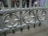 Fence - at G. Krug and Sons - detail of circles, bars, and spears after repair and priming - September 28, 2010