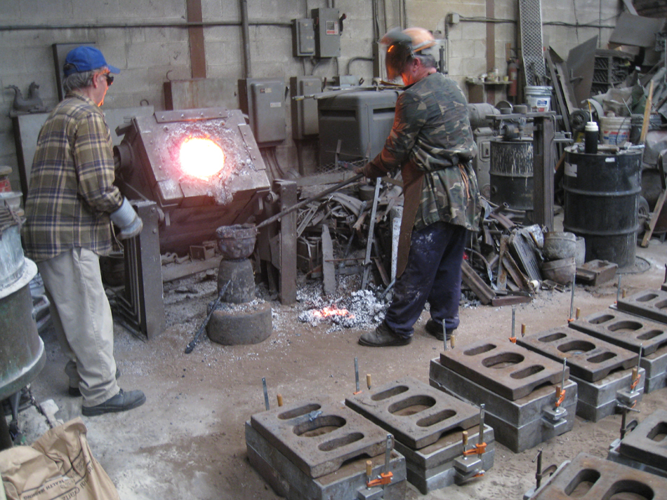 Fence -- Swiss Foundry -- furnace with metal for fence elements. Owner Vojislav Veljko on left.