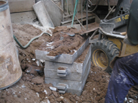 Fence -- Swiss Foundry -- extracting fence elements from cooling molds.