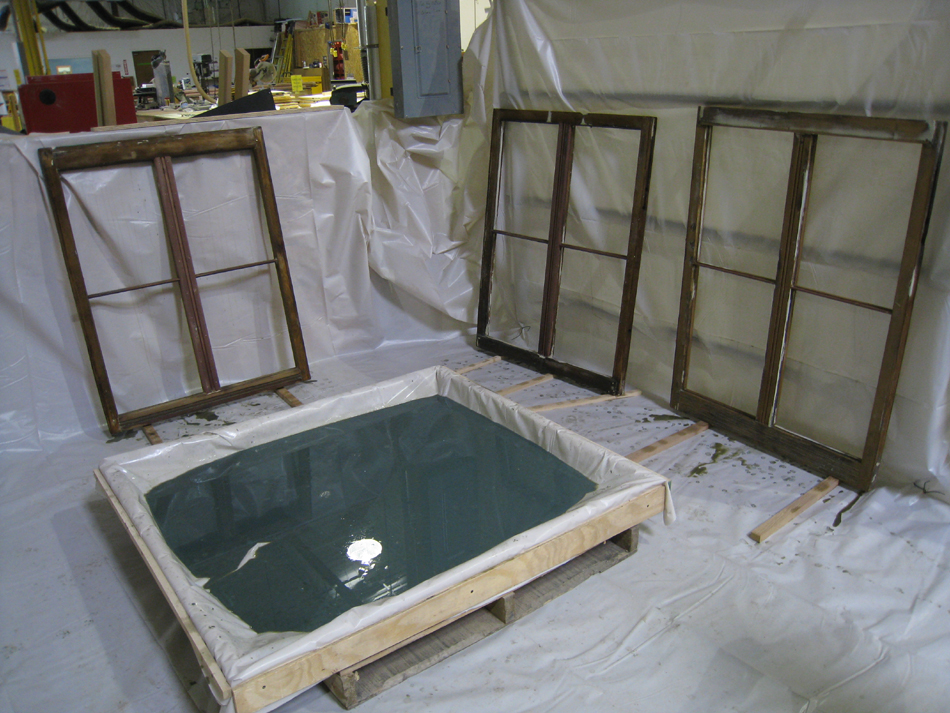 Doors and Windows -- SRS Corp. -- wood preservative bath being used prior to final sanding and priming.