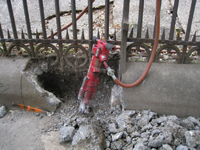 Fence--Removal of cement from bottom of fence on Pennsylvania Ave. side - October 19, 2010