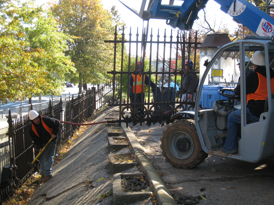 Fence--Removing fence section from Pennsylvania Ave. side for restoration