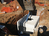 Geothermal/HVAC--Lowering vault sections into place - November 8, 2010