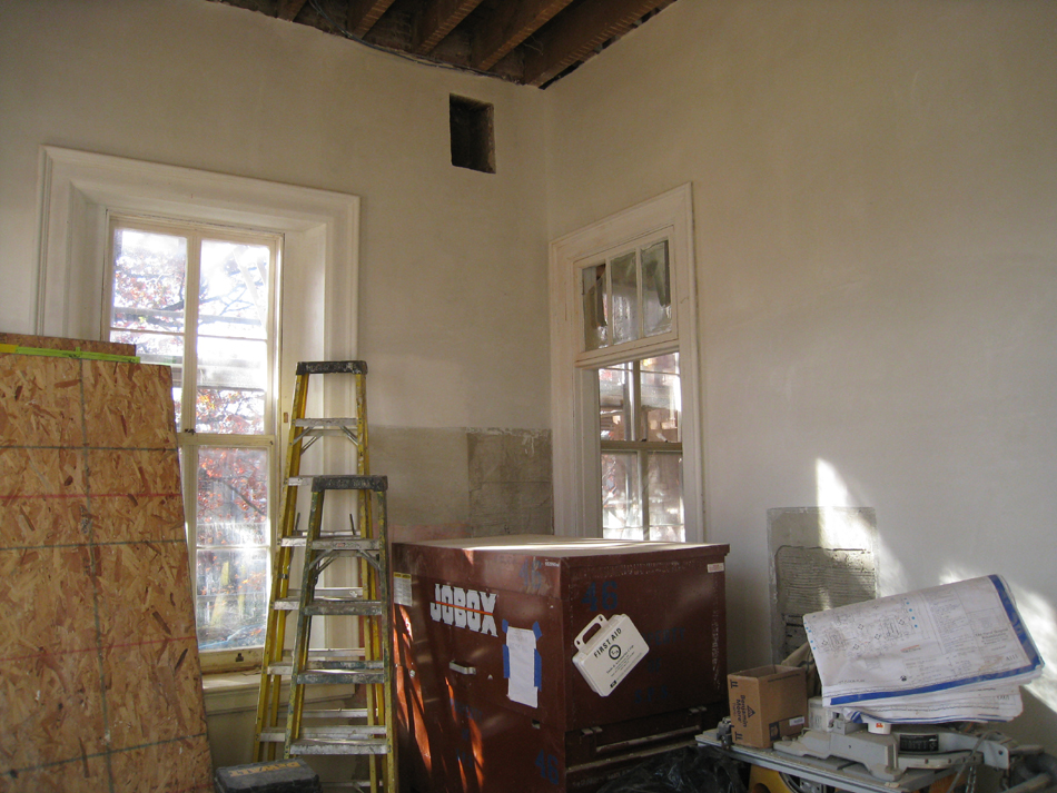 First Floor--Final skim coat for plaster in south east corner