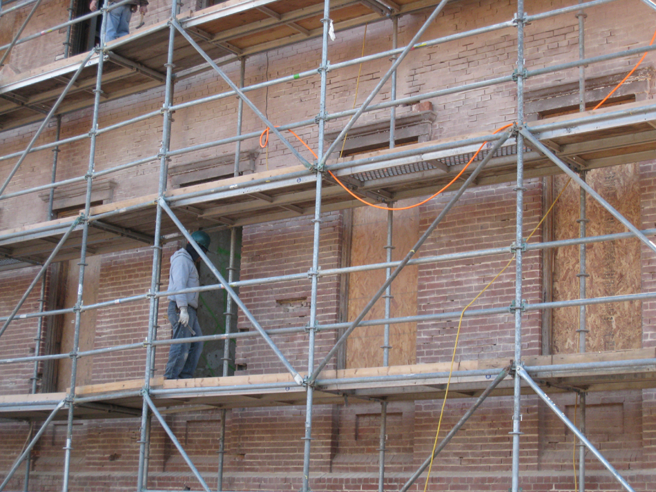 Elevation--East wall repointing preparation--lower level nearly complete, upper level not done