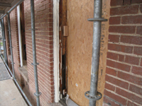 Elevation--West side, first floor, detail of restored window frames before priming - December 2, 2010