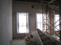 Second Floor--Central (large) room showing brown plaster and column preparation - December 28, 2010