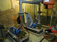 Ground Floor (Basement) --Installing HVAC equipment in northeast room - January 7, 2011