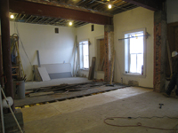 Second Floor--Central large room, installing floor underlayment - February 1, 2011