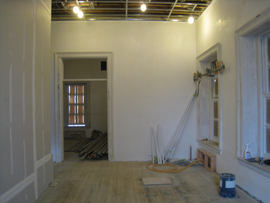 Second Floor-Southeast corner room showing newly installed restored windows and sanded floors - February 1, 2011