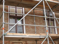 Windows and Doors--Partially finish painted windows on north side - February 18, 2011