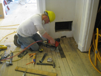 Second Floor--Floor repair before final sanding and sealing, northwest corner room - March 3, 2011