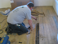 Second Floor--Floor repair before final sanding and sealing, northwest corner room - March 3, 2011