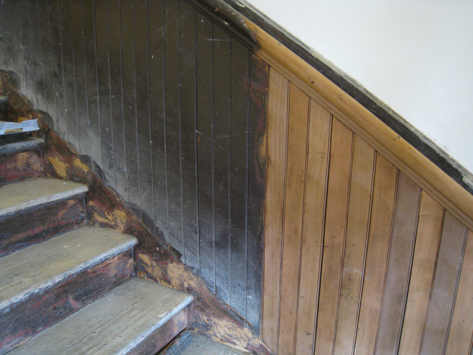 Third Floor--Detail--Sanded and unsanded railing for the central staircase (note the two alternating woods in the chair rail) - March 14, 2011