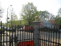 Fence--Looking out toward the corner of Tenth and E Streets SE with model of corner piece in place - April 20, 2011