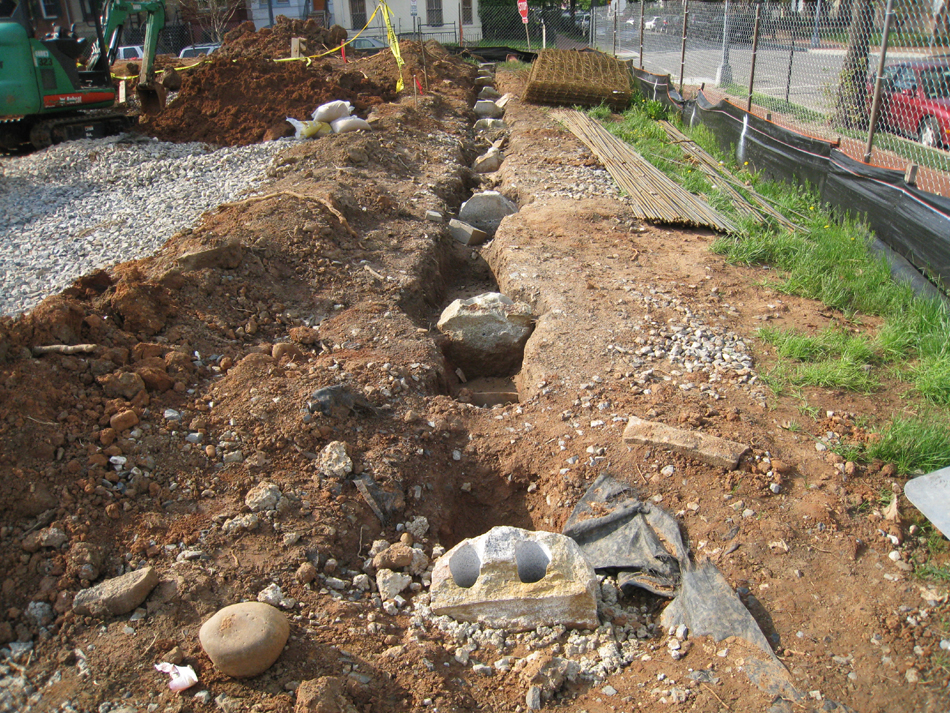 Fence--Uncovered and drilled fence bases (original) on west side of property - April 20, 2011