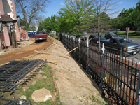 Fence--Installing fence along Pennsylvania Avenue - April 29, 2011