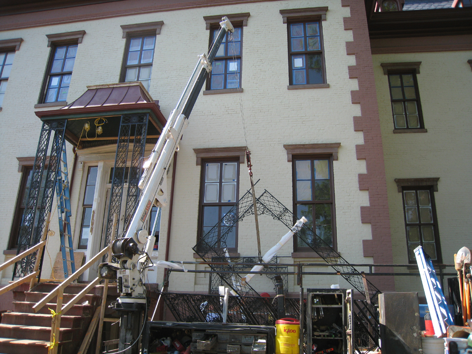 Elevation--North portico ironwork being installed - June 2, 2011