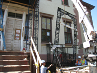 Elevation--North portico ironwork being installed - June 2, 2011