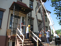 Elevation--North portico ironwork being installed - June 2, 2011