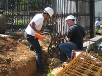 Fence--Installing on the south west corner - June 2, 2011