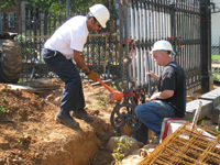 Fence--Installing on the south west corner - June 2, 2011