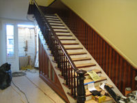 First Floor--Stained and finished rail and side of main staircase - June 2, 2011