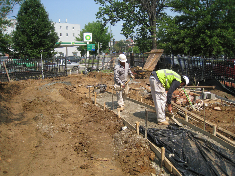 Grounds--Preparing for pouring concrete for sidewalk (north west corner) - June 10, 2011