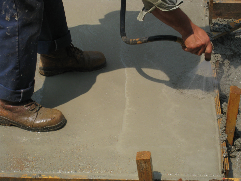 Grounds--Taking top coating off to expose small stone - June 10, 2011