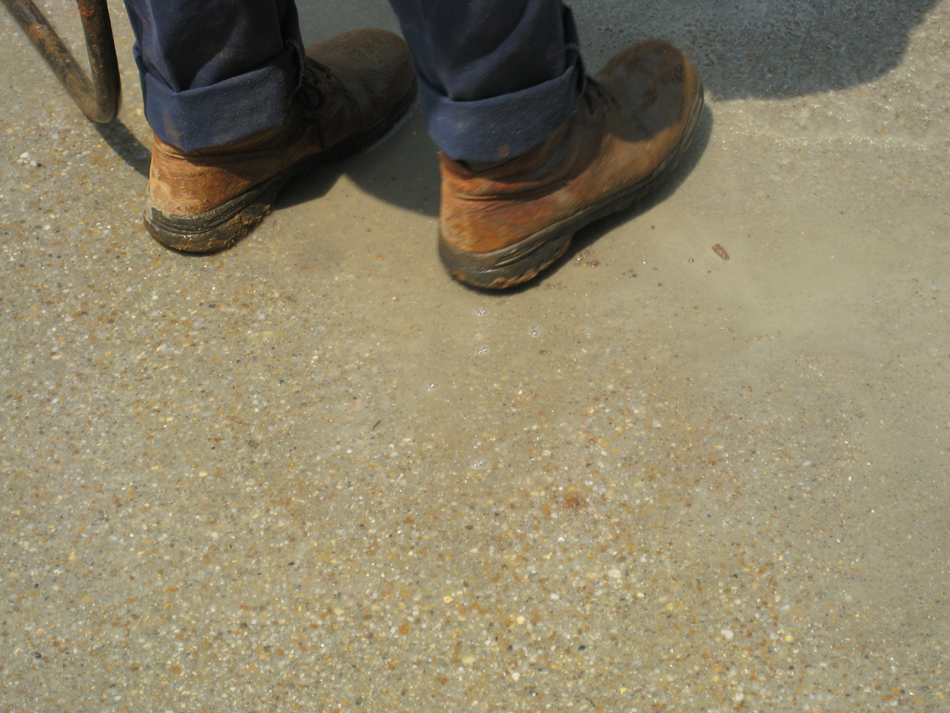 Grounds--Taking top coating off to expose small stone - June 10, 2011