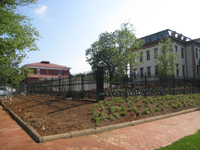 Grounds--South west corner, planting in progress - July 9, 2011