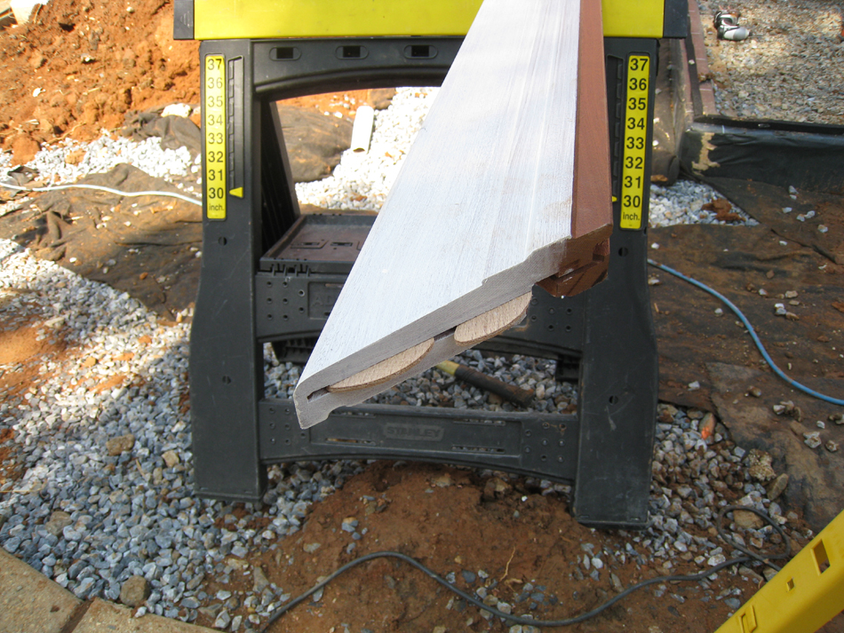 Carriage House--Detail of clear African Mahogany for the base for the addition--primed for outside, stained for inside - July 9, 2011