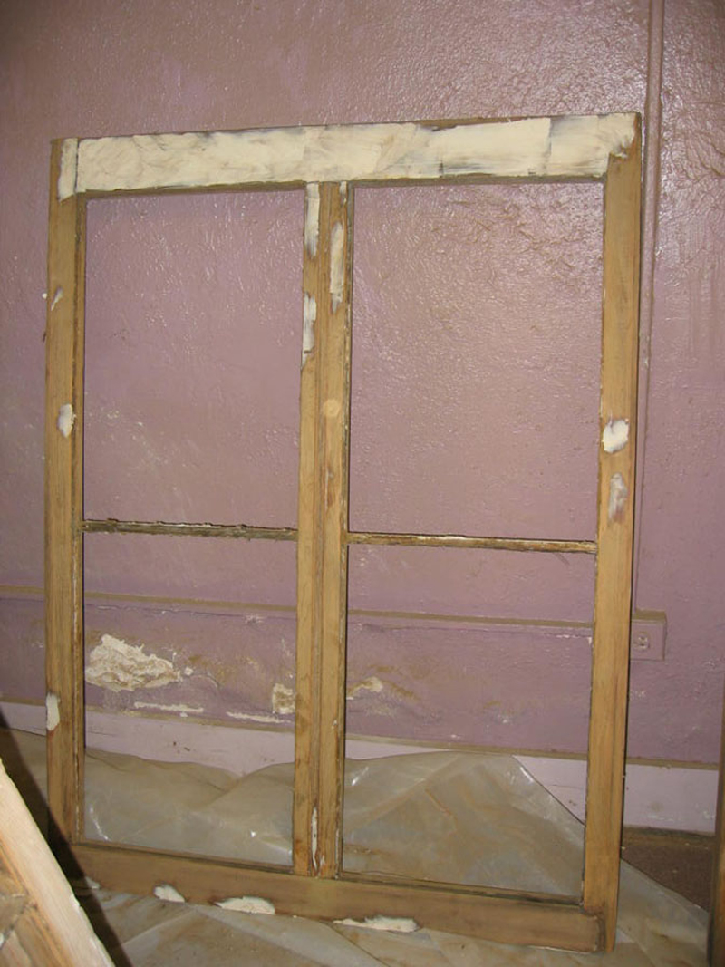 The sash was sanded to smooth all surfaces and to remove any remaining residue from the  paint. Epoxy filler was then applied as necessary to bring the sash to its original form and  smoothness.