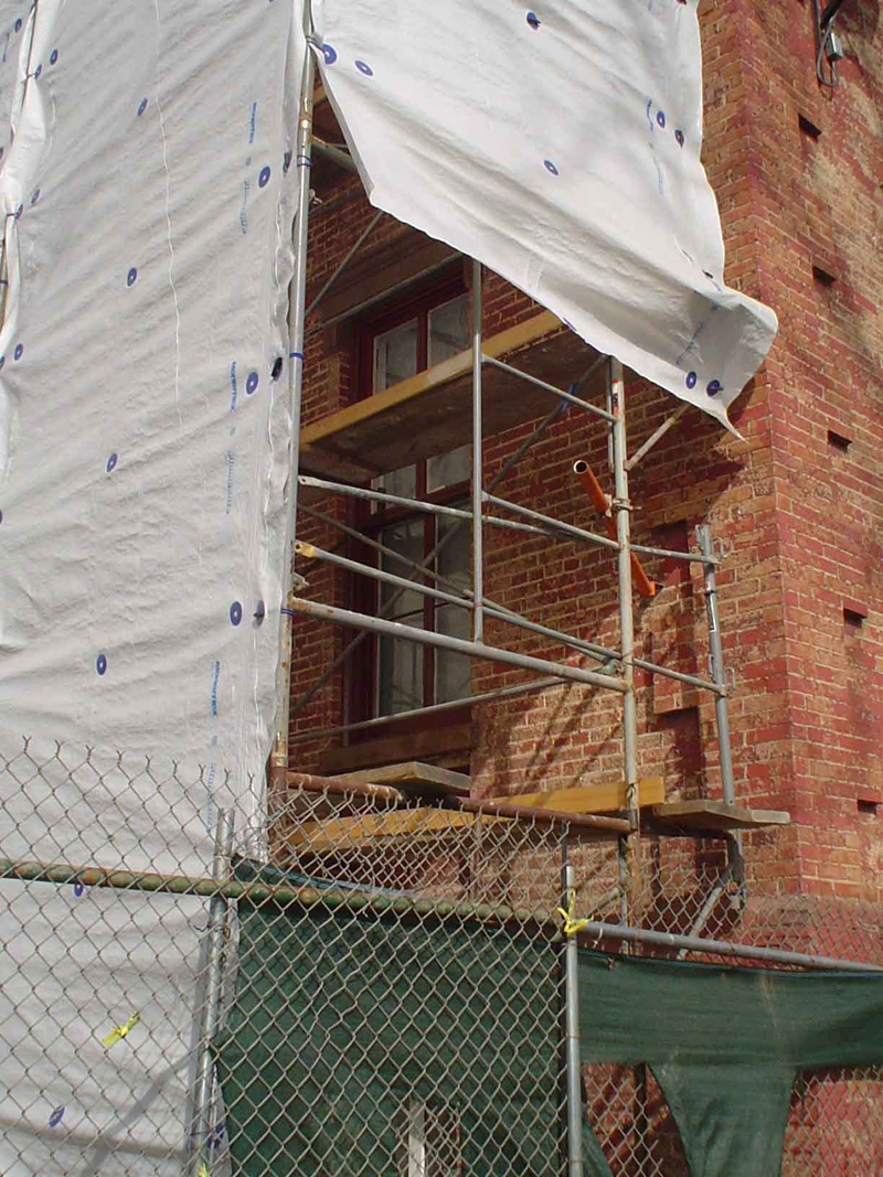 The metal at the bottom of the basement windows will be painted to match the windows. The 
color analysis is completed and was submitted to BELLArchitects with color draw-downs, and the 
Munsell Color Number for exterior windows and frames. It is a reddish brown color and has been 
applied to one window so far. Note in this photo this fully researched new color, since it will 
be the color used for all the windows and doors.